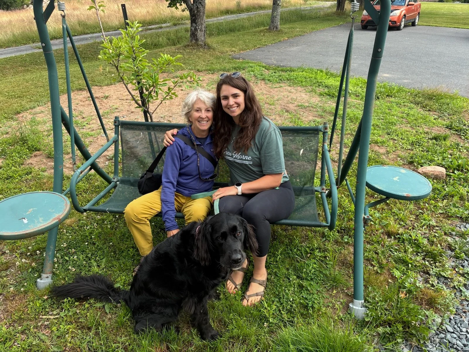 Susan Gesner Happiness Blog with friend and dog on swing.jpeg