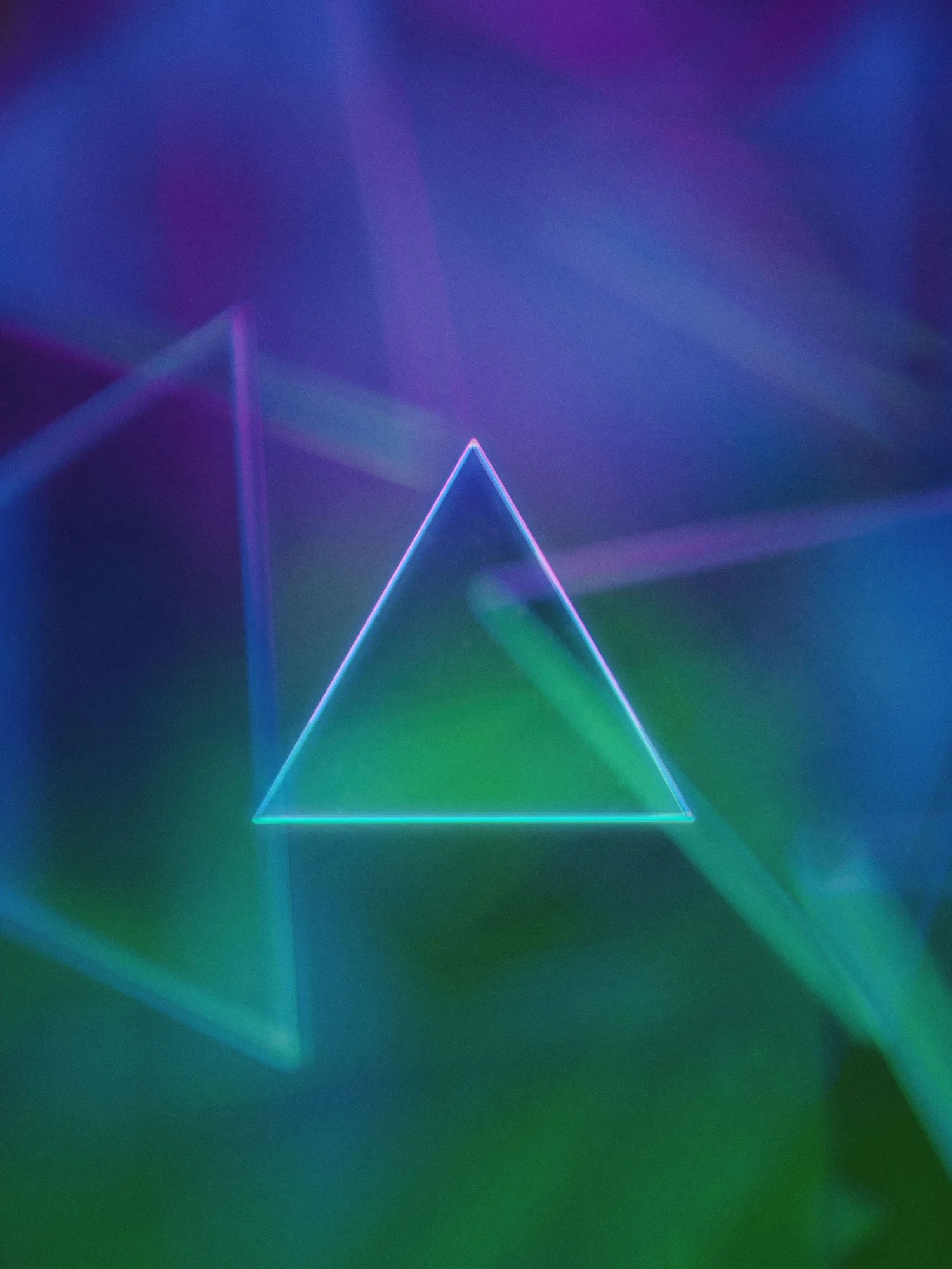 Abstract triangular forms made from light, created and finished in CGI by Radwolf