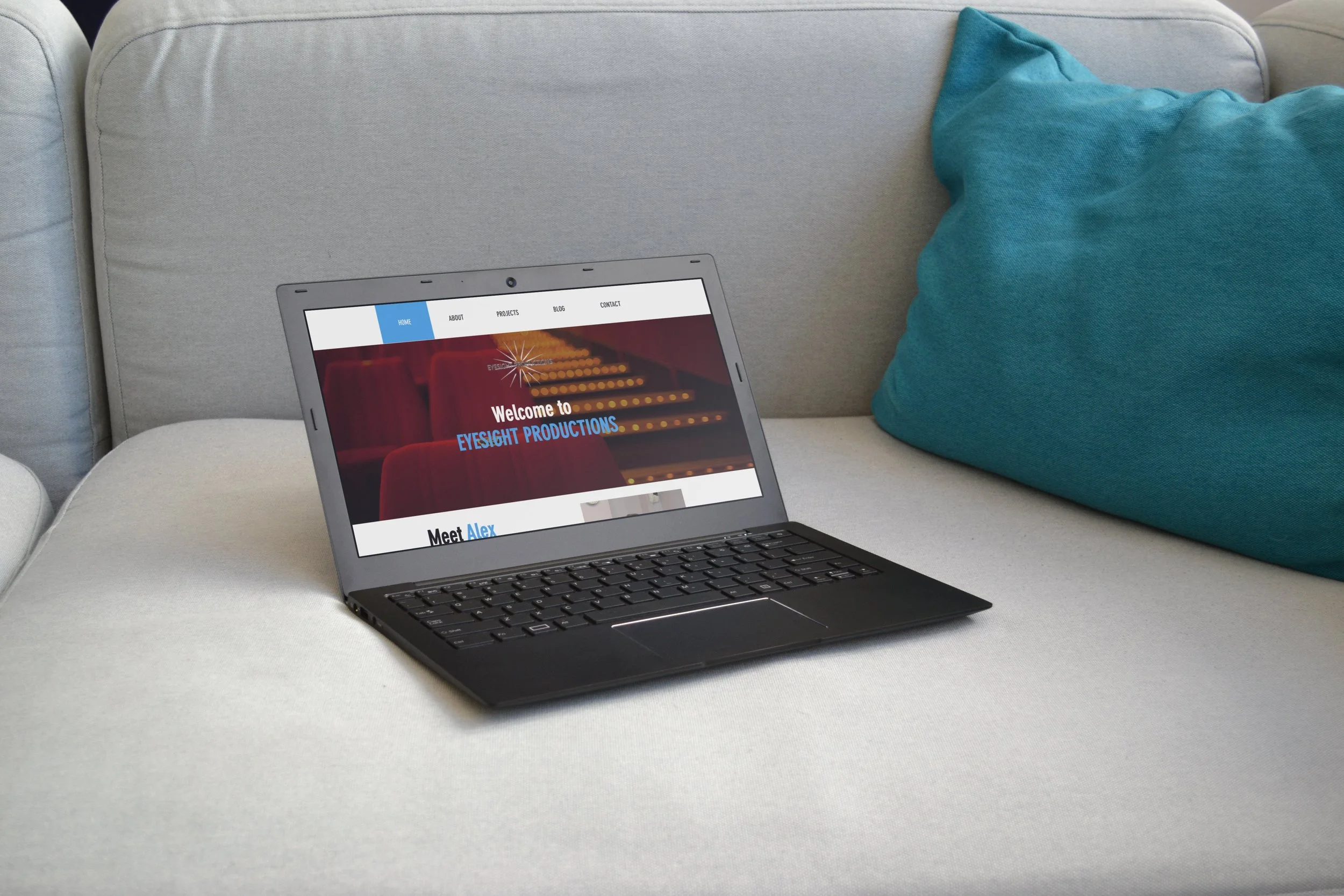 PC laptop on sofa-min.jpg