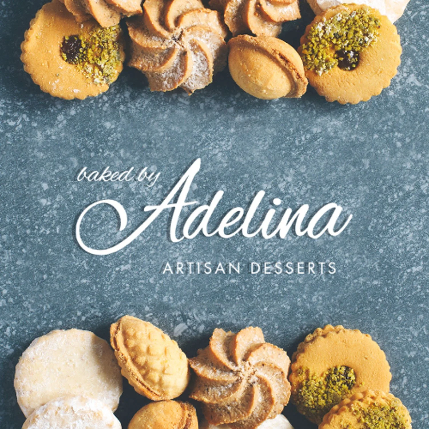 Assorted artisan cookies arranged around a blue textured background with text that says 'baked by Adelina Artisan Desserts'. Logo designed by Brim and Bold Creative.