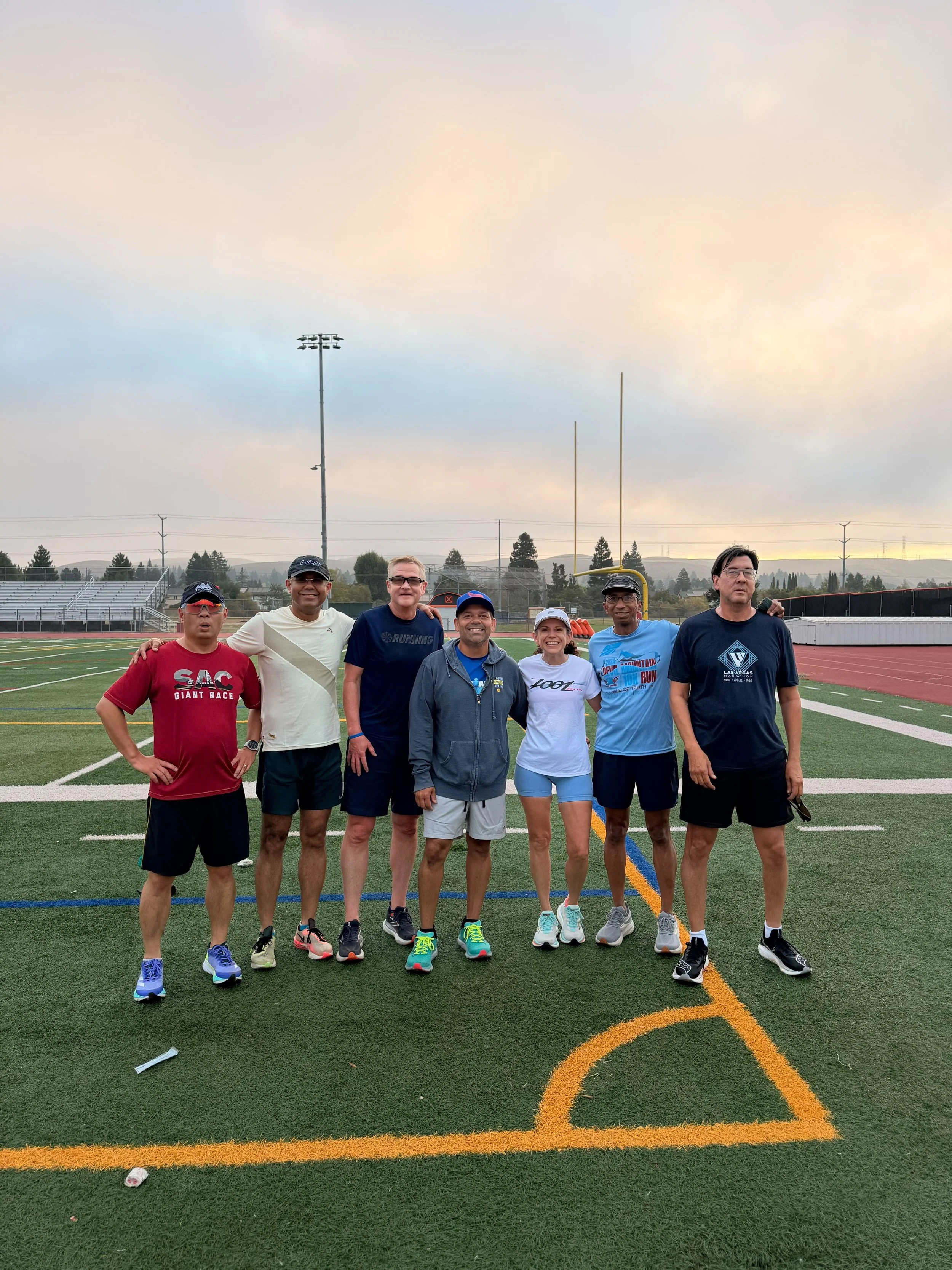 Running Fit Lab Track Speed Workout Group Photo.JPG