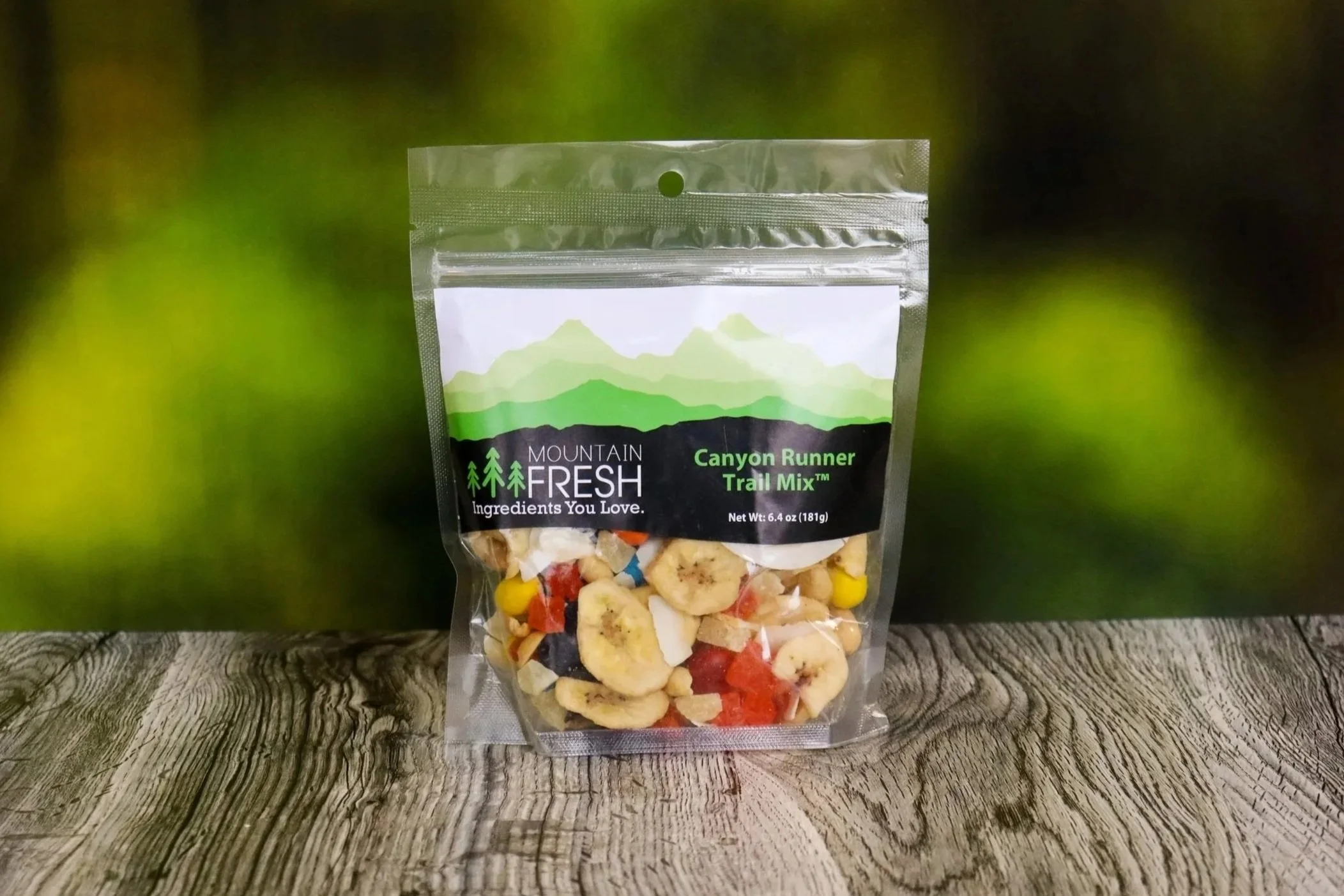 Canyon Runner Trail Mix: Chocolate candies, peanut M&M's, raisins, banana chips, pineapple, papaya, peanuts, almonds, coconut