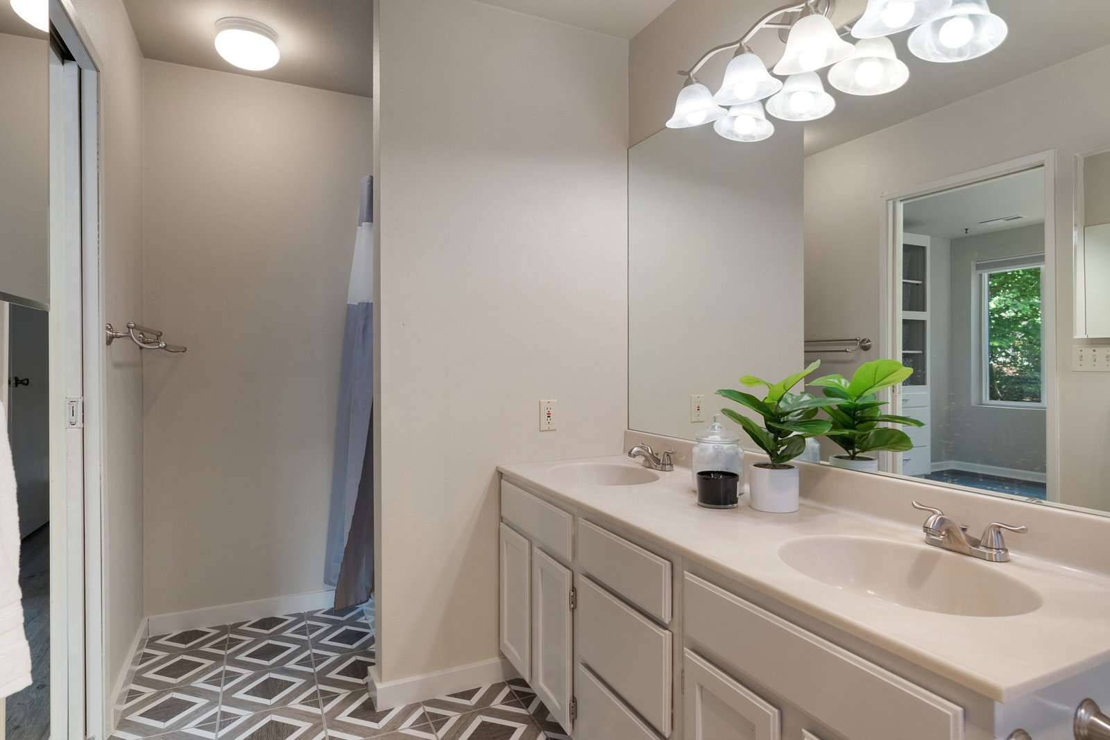 primary bathroom in white with a brown and brown flooring