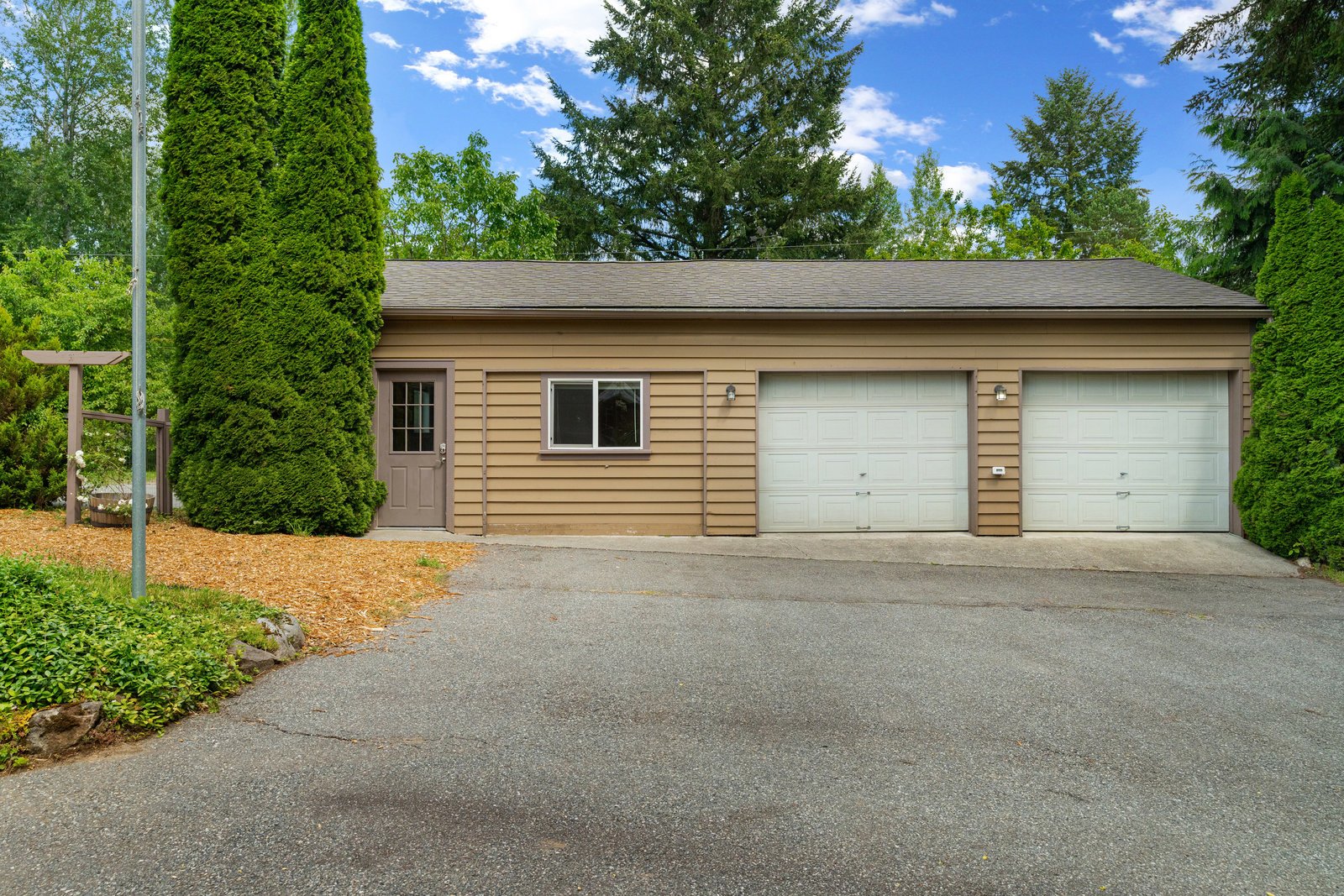 full of the detached garage in brown and white