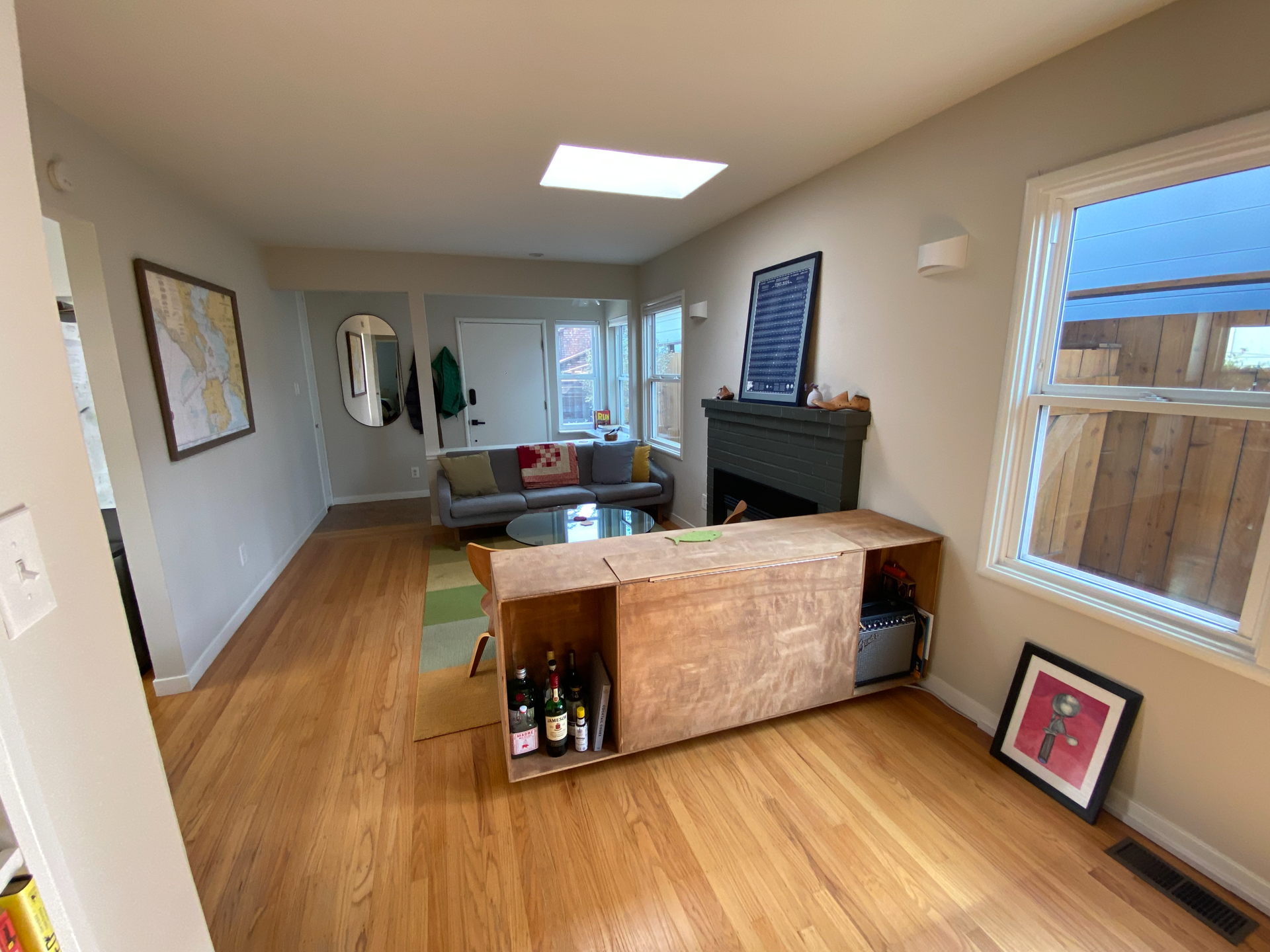 TV/bookshelf/liquor cabinet (closed). Can remain in the house or be removed at tenant's preference. 