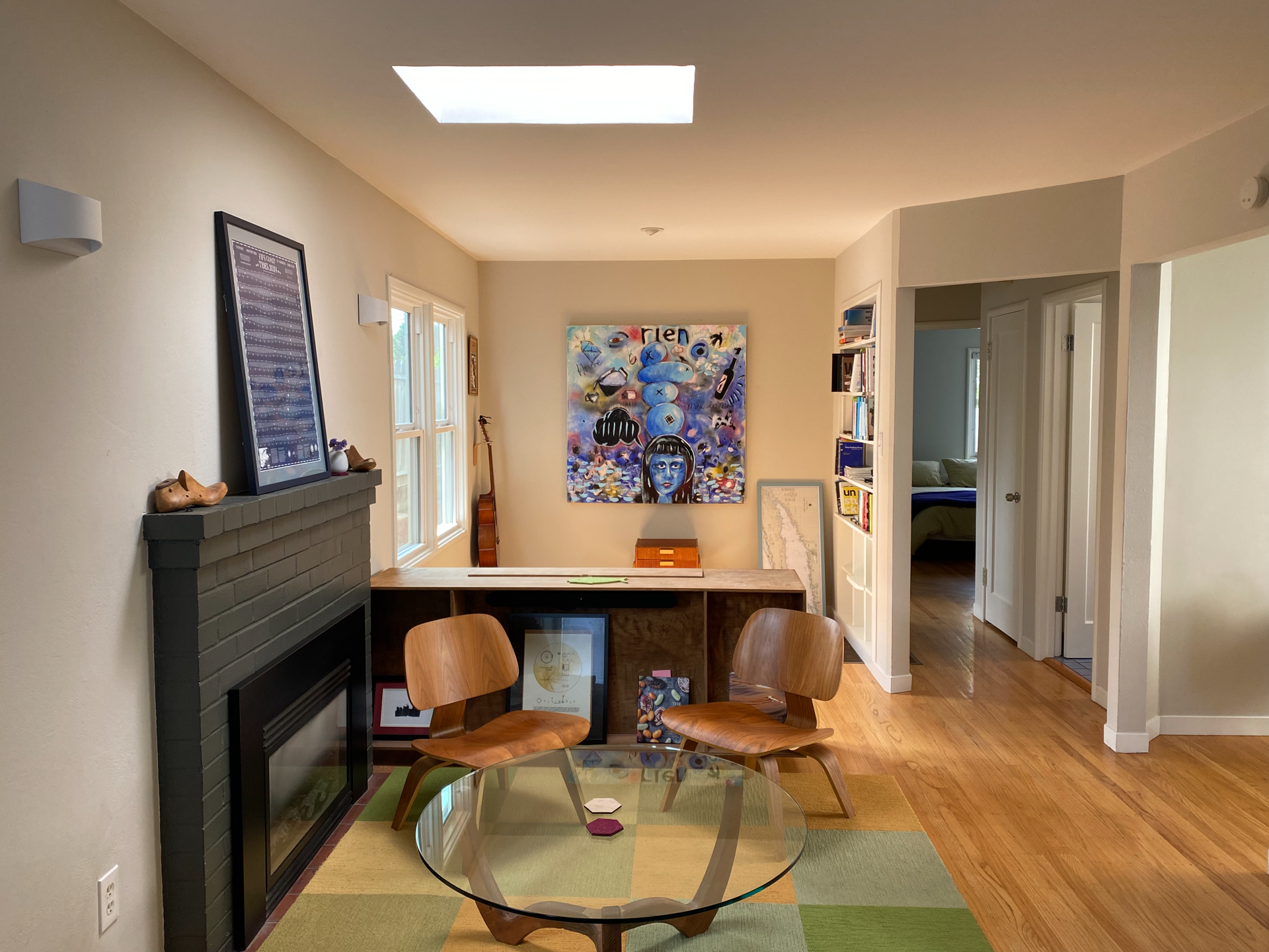Livingroom with TV hidden. Remote controlled, silent TV cabinet can remain with house or be removed. (Tenant's choice.)