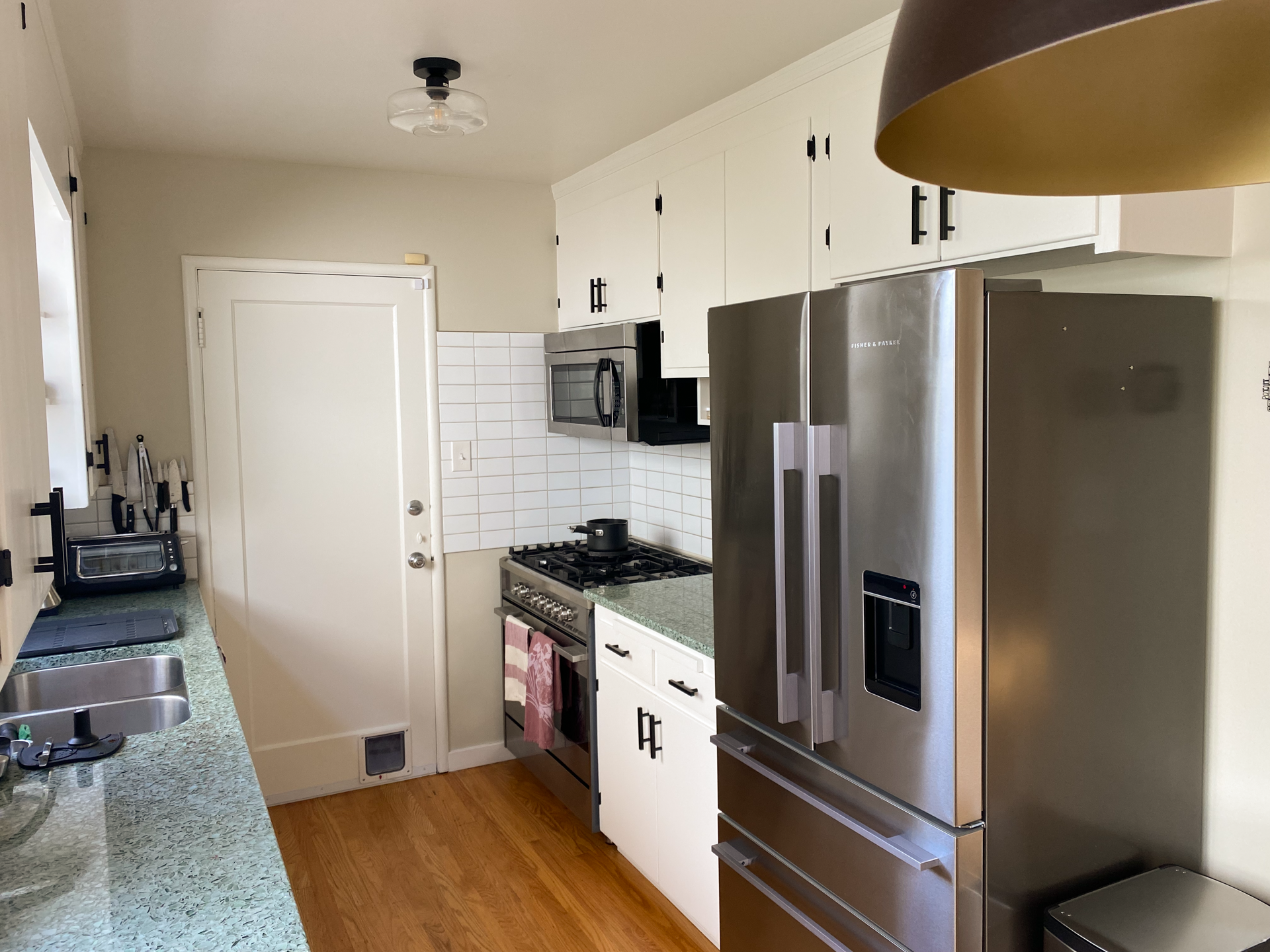 Kitchen with door to attached garage.