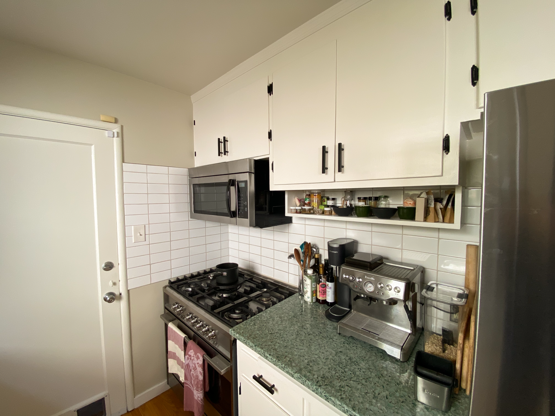 Fisher Paykel oven and range. Built microwave. 