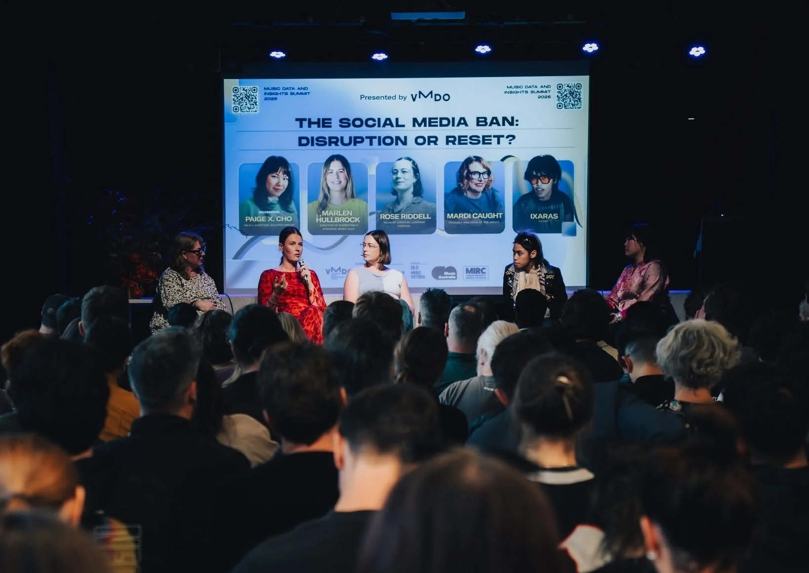 Picture of Paige and the panelists on stage during the MDIS social media ban panel.