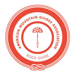Logo of the American Mountain Guides Association featuring a rock climbing figure inside a circular border.