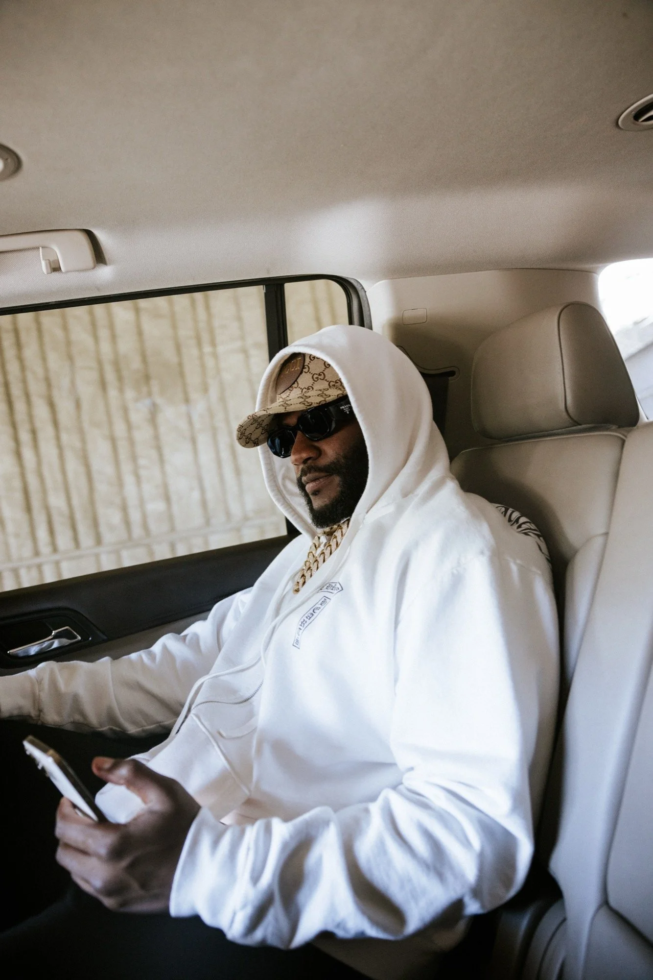 Natural light portrait in vehicle — portrait photography — Universal Black Media Philadelphia