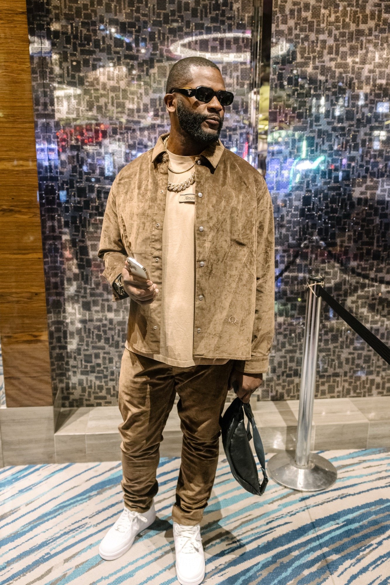 Lifestyle portrait against mosaic wall — portrait photography — Universal Black Media Philadelphia