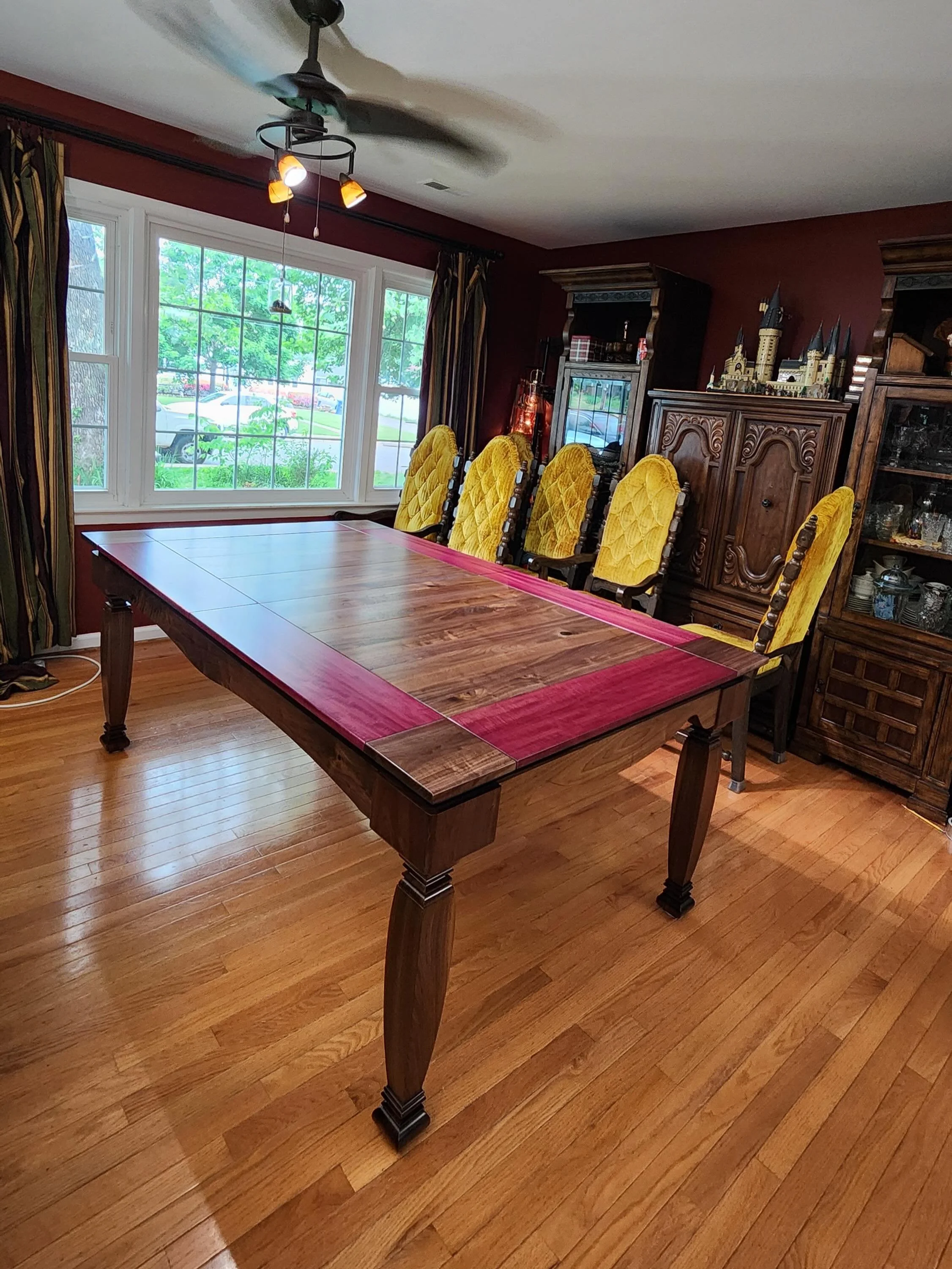 I delivered this one of a kind table to some one of a kind clients! They asked for some really unique design features and I was able to come up with this table that fit their vision. They even got a custom plastic topper to cover it, but be able to s
