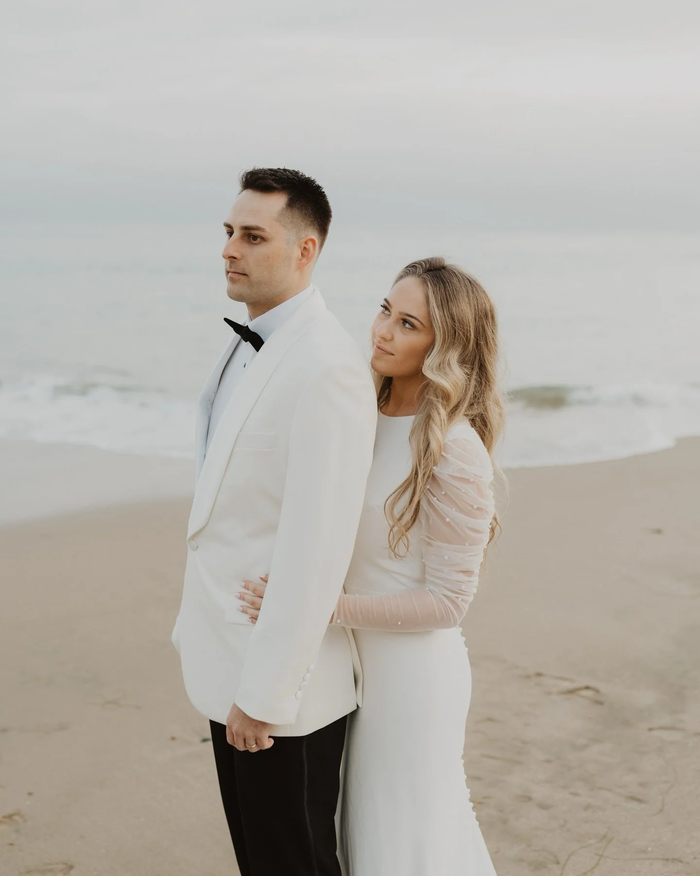 Where elegance meets beach babes 🌊🕊️

California luxury, California bride, luxury wedding photographer, travel photographer, destination wedding, beach bridals, bridal session, white tux, bridals inspiration, bridal era, 2026 bride