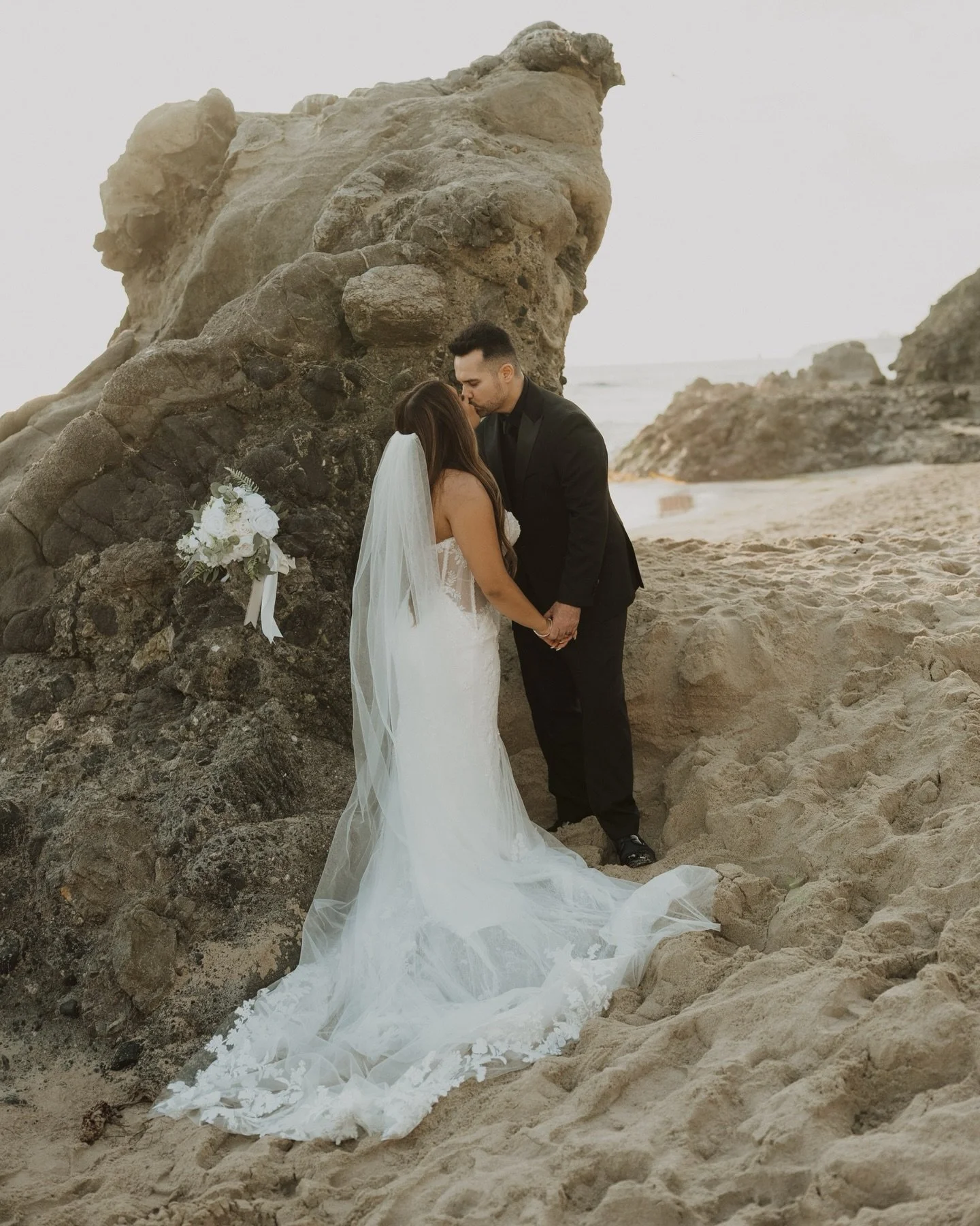 He proposed here, she said &lsquo;yes&rsquo; here. Then, they read their vows here 😭

Dress @maggiesotterodesigns @bowtiesbridal 
Heels @betseyjohnson 

weddingportraits beachelopement elopement beachwedding  bridalphotos elopementphotographer justm