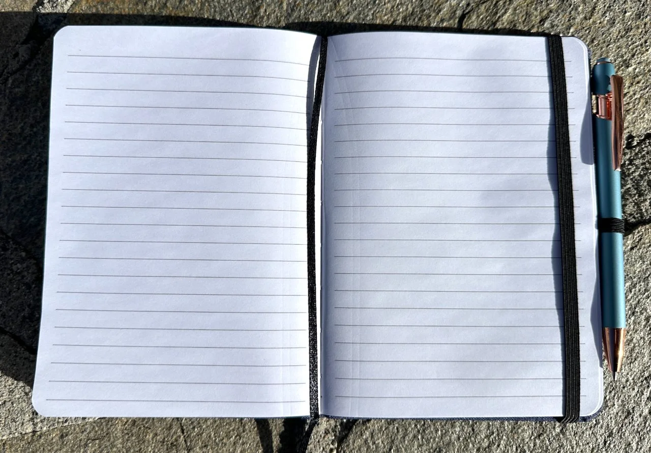 Blue notebook pages.jpeg