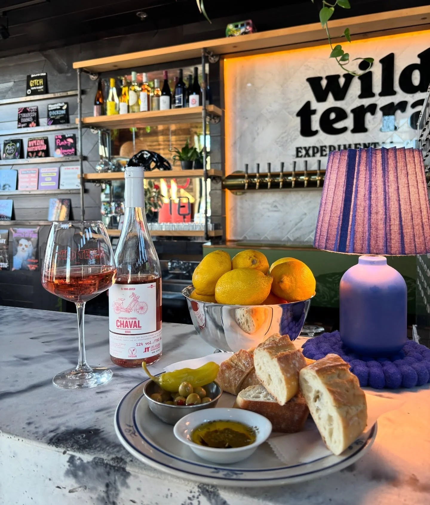 One of our ✨new✨spring bar plates 🌷
Olives &amp; peppercini 🫒
Toasted baguette 
Bread oil with oregano and chili crisp 😋
Highly suggest a glass of our new ros&eacute; 🍷to pair 
Terra Bread Plate $11
