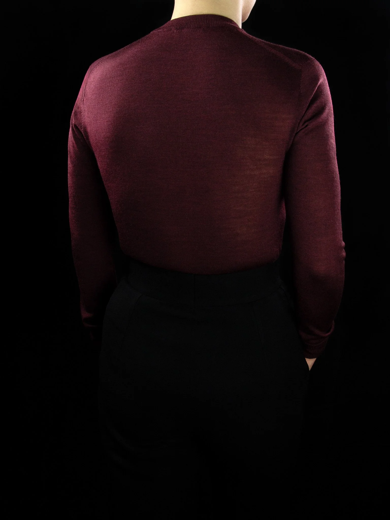lawton-womens-V-neck-jumper-burdundy-worn-back.jpg
