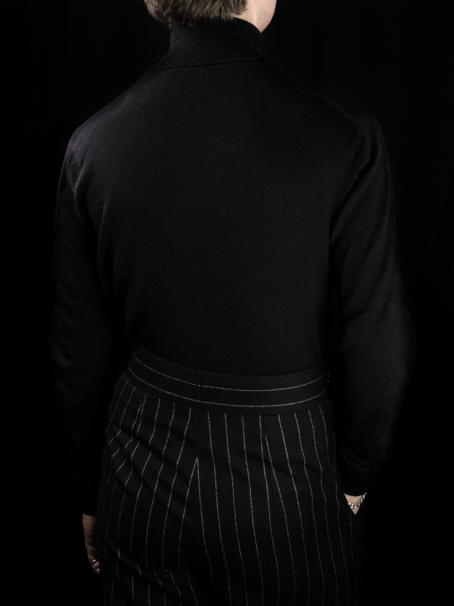 lawton-mens-roll-neck-jumper-black-worn-back.jpg