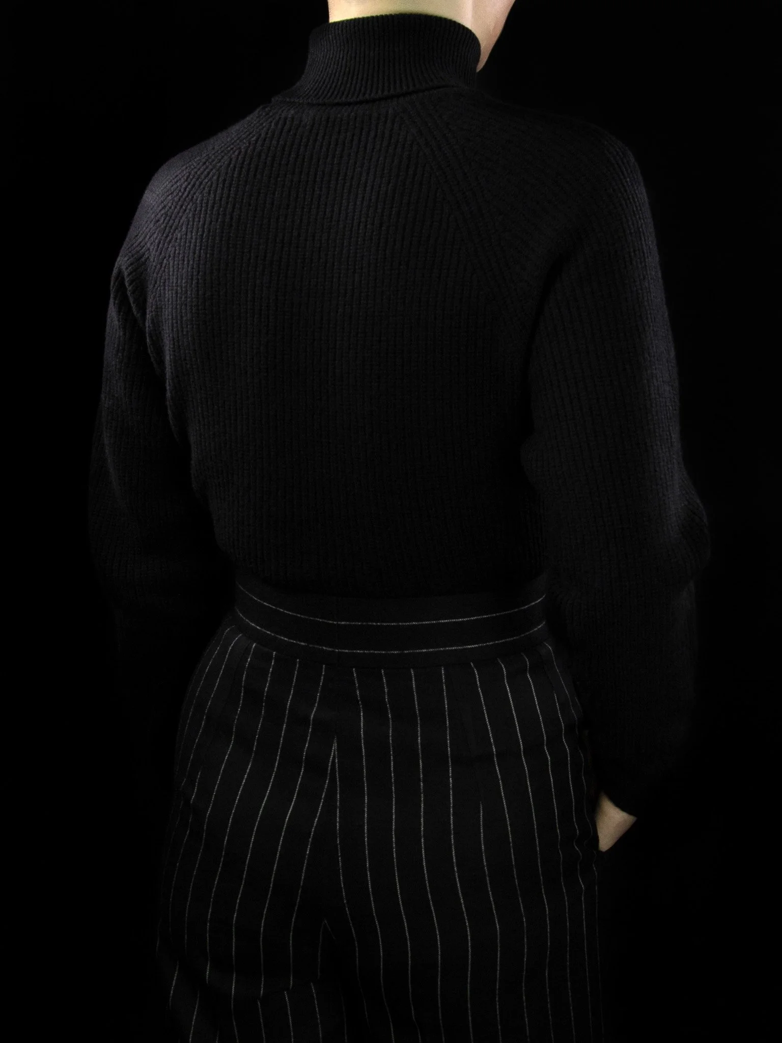 lawton-womens-english-rib-roll-neck-jumper-black-worn-back.jpg