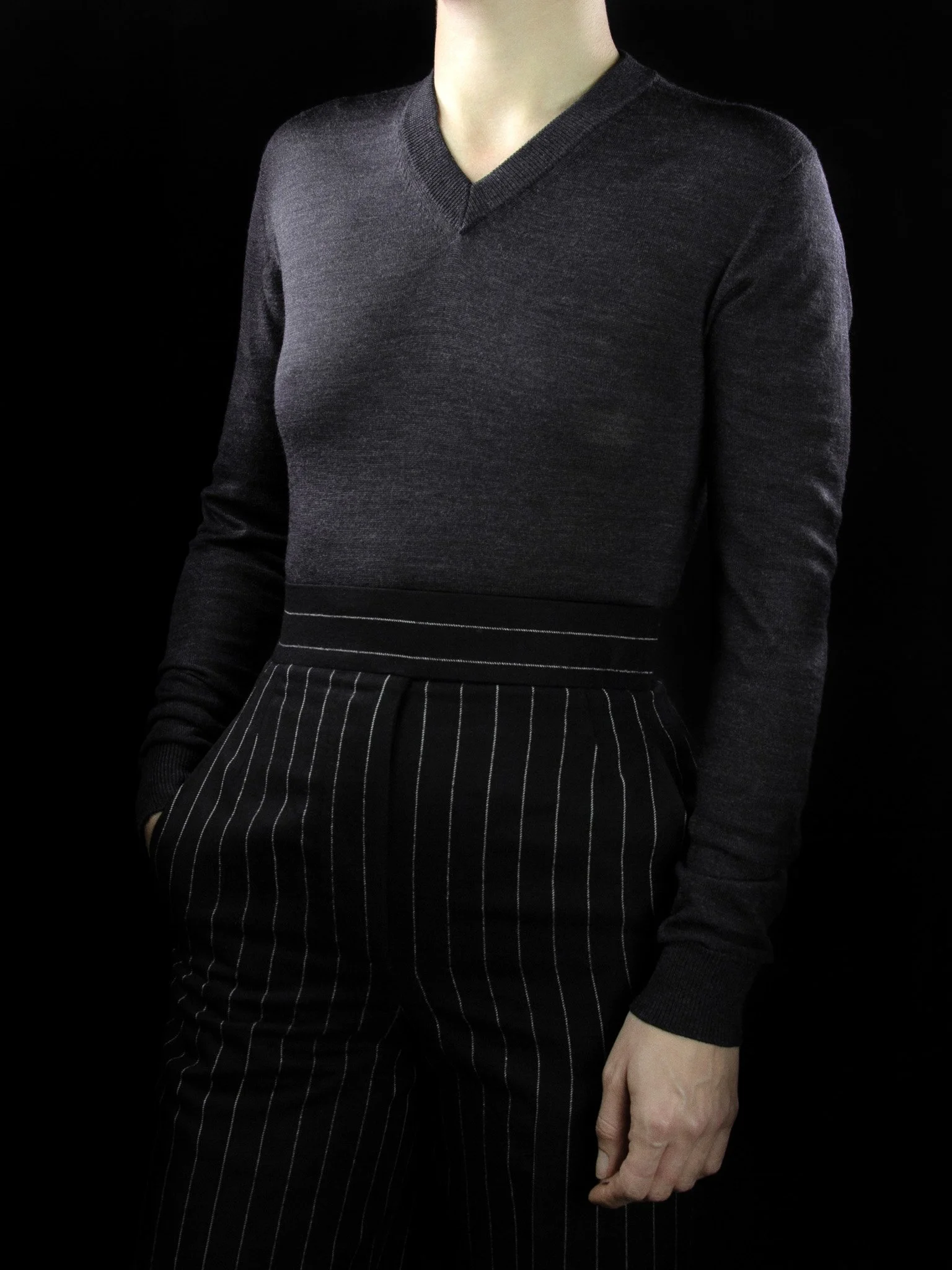 lawton-womens-V-neck-jumper-charcoal-worn-front.jpg
