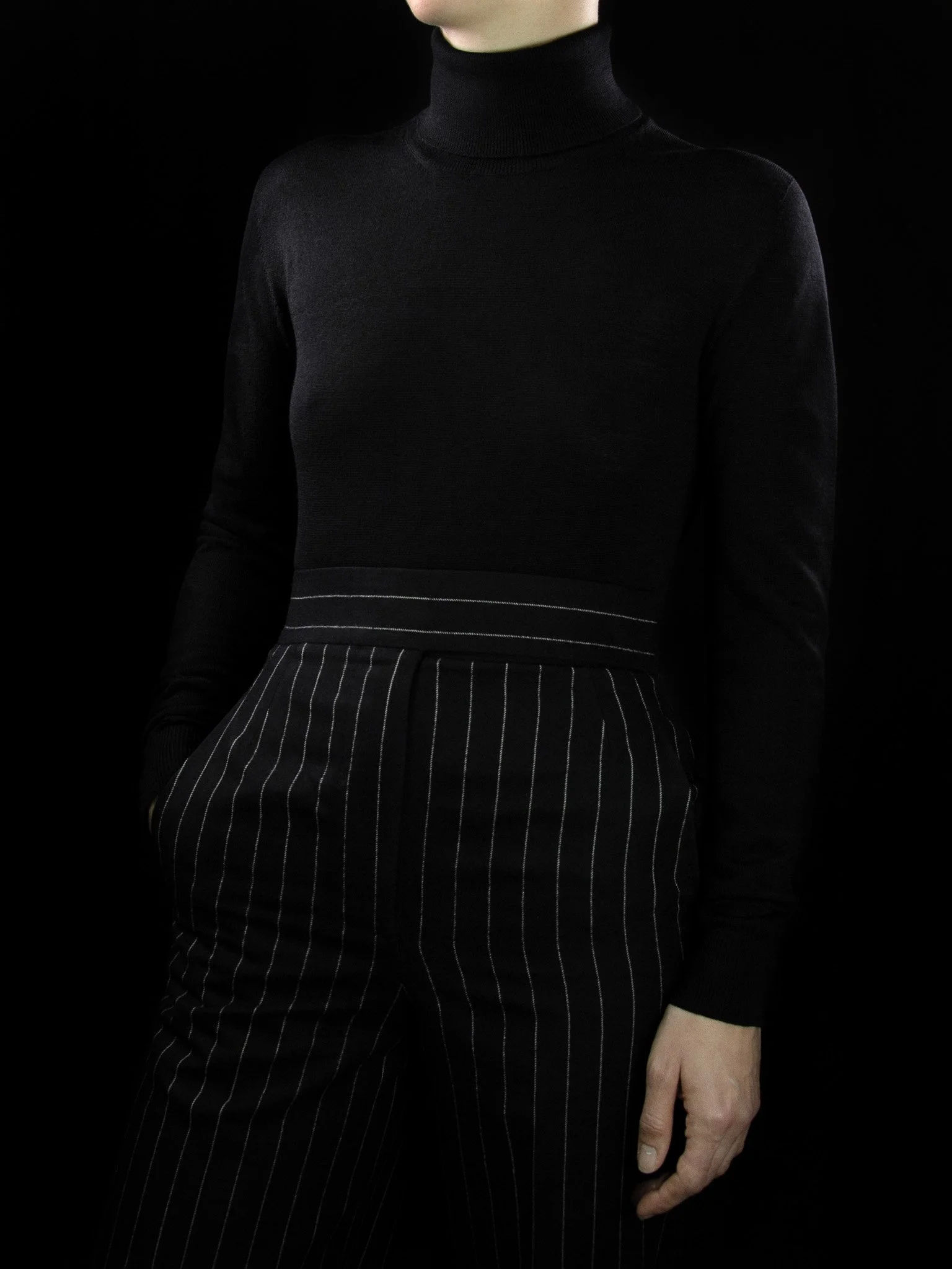 lawton-womens-roll-neck-jumper-black-worn-front.jpg