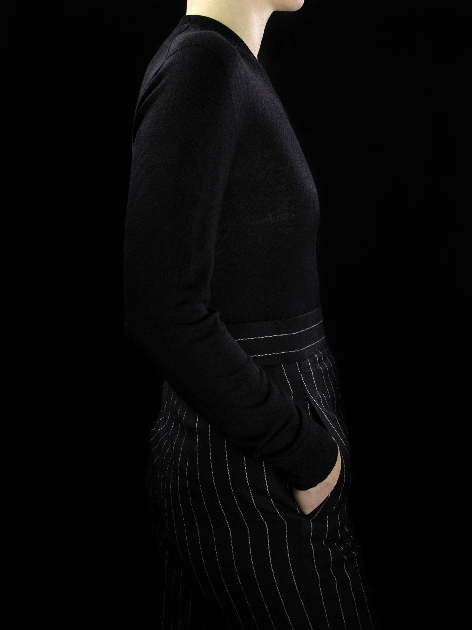 lawton-womens-V-neck-jumper-black-worn-side.jpg