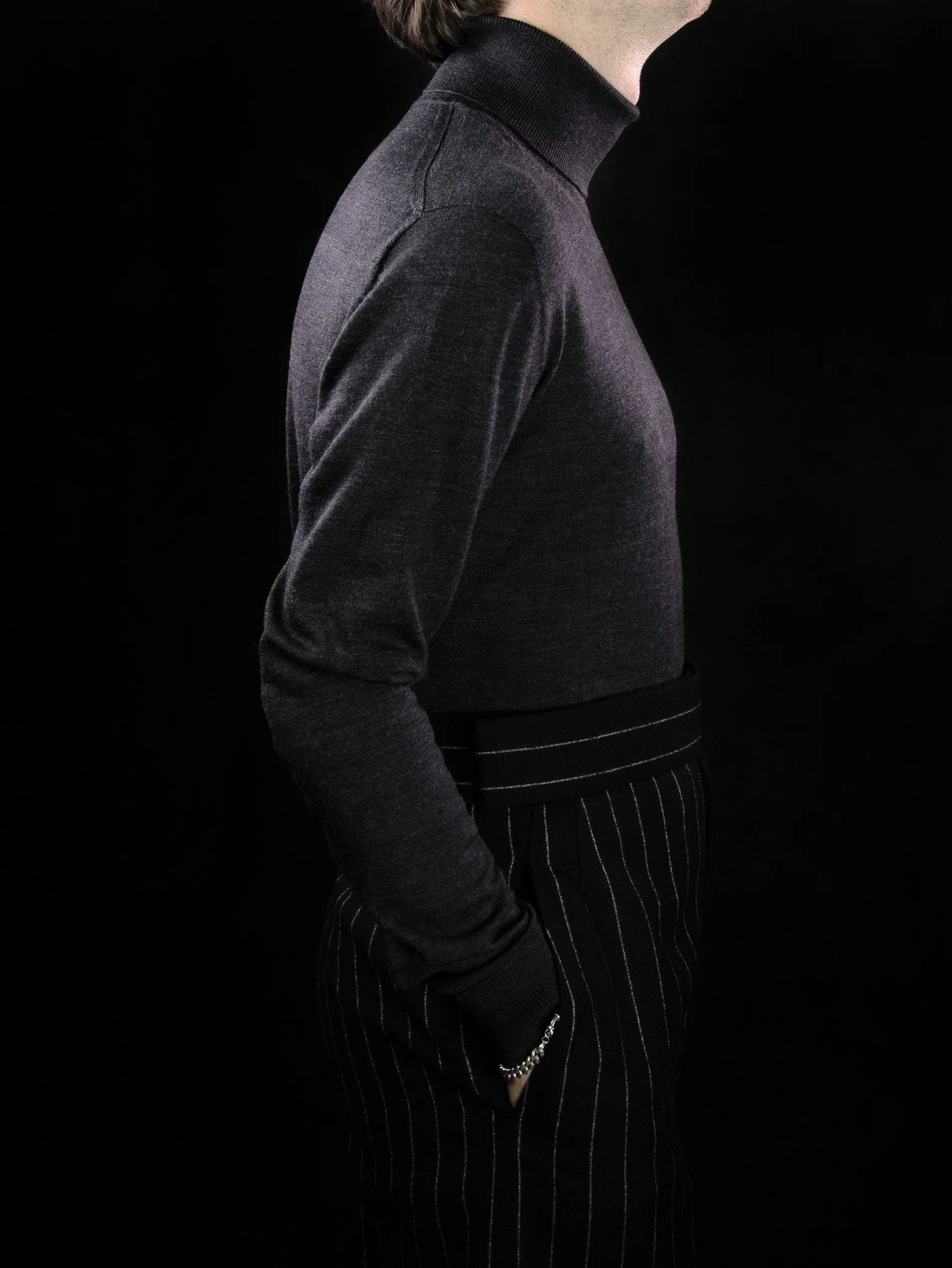 lawton-mens-roll-neck-jumper-charcoal-worn-side.jpg