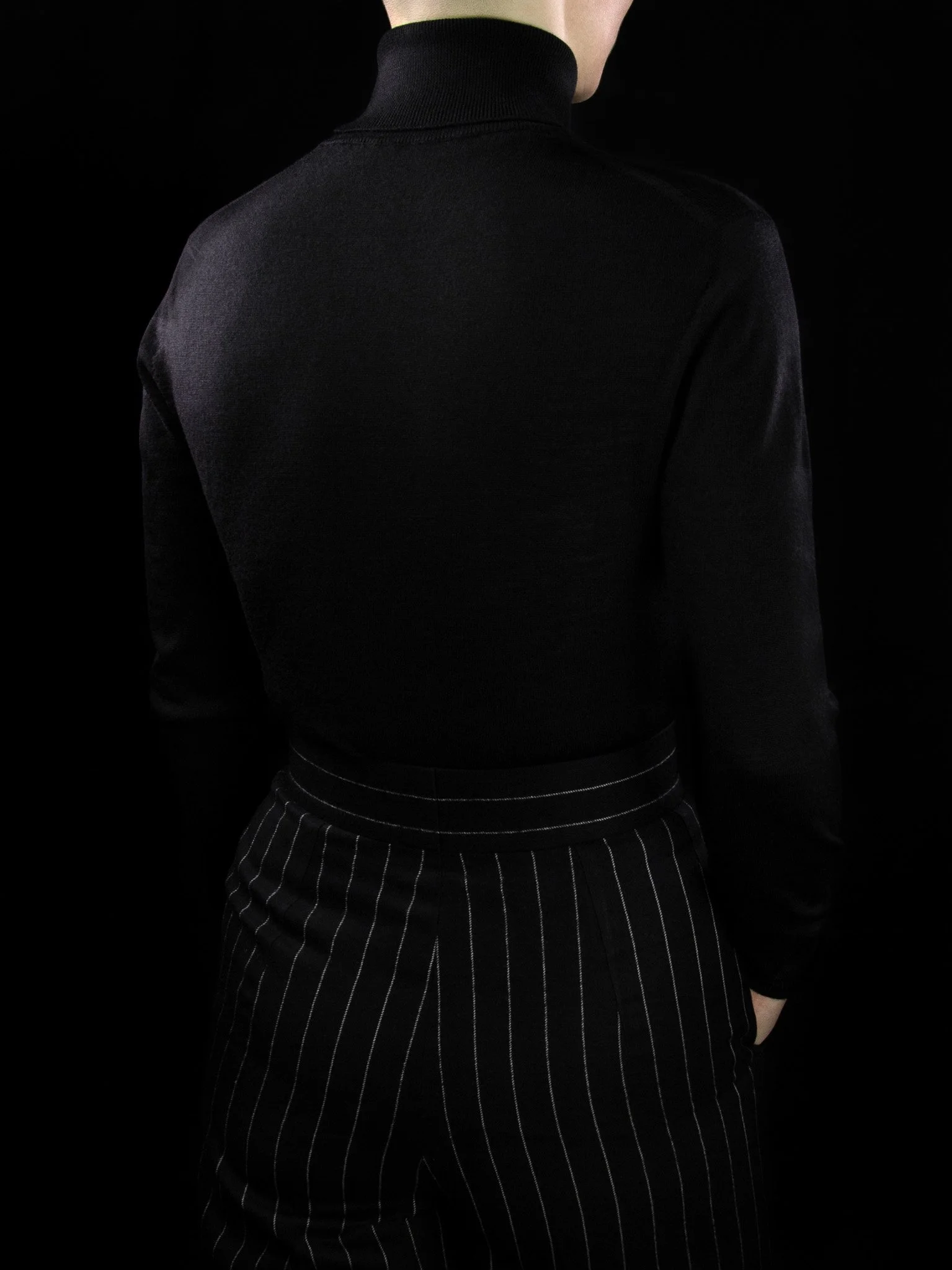 lawton-womens-roll-neck-jumper-black-worn-back.jpg