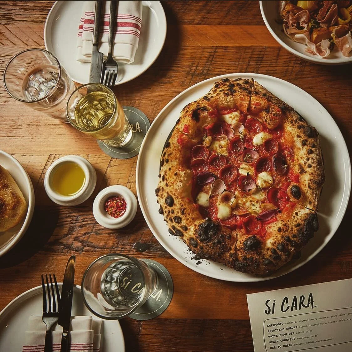 If Friday were a food, it would be pizza (with house-made chili flake &amp; roasted garlic oil) 

📸 @briansamuelsphotography 

We keep 40% of our seats available for walk-ins every day of the week! 

 #yesdear #canotto #gluenloversonly #sicara #camb