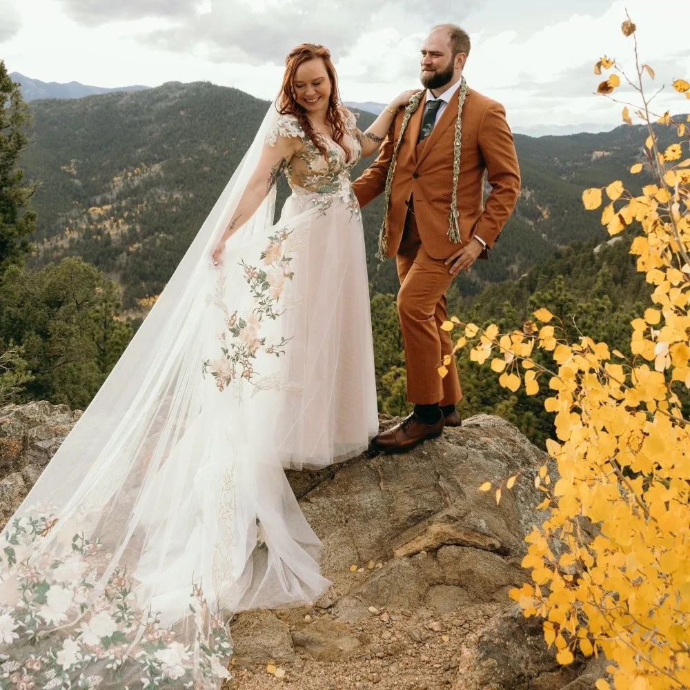 My beautiful bride Nicole sent me photos. I had worked with Nicole before so I was really excited when she arrived with her wedding gown. I absolutely love wedding dresses with a splash of color, and this one matched Nicole's personality perfectly. P