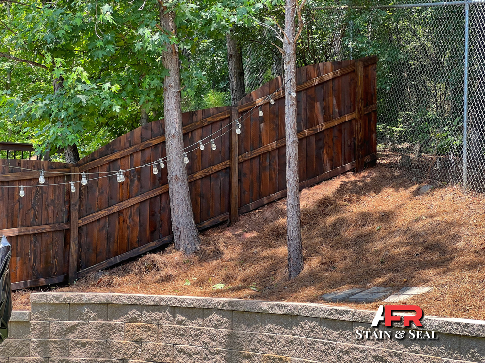 8ft privacy fence stained with oil-based mahogany
