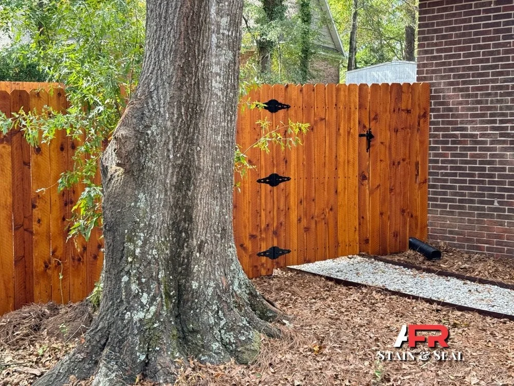 Privacy fence with dark stain finish
