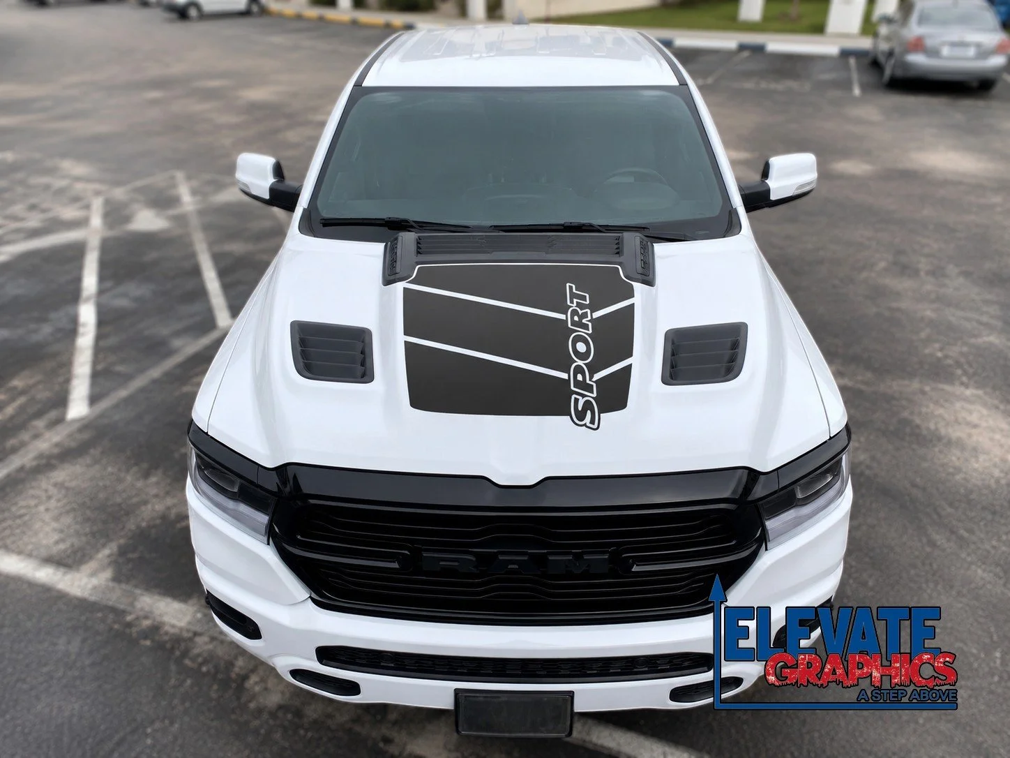 White RAM Sport Truck in Parking Lot-Photoroom.jpg