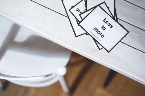 less is more card for decluttering