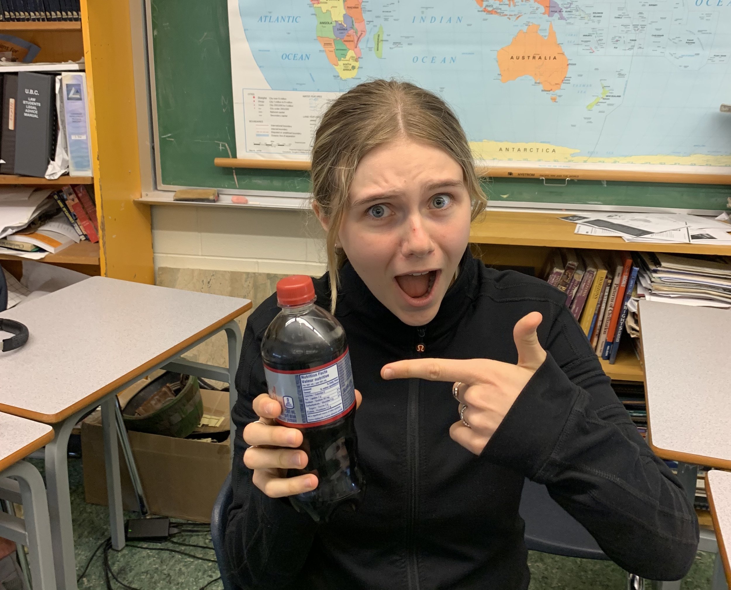  Editorial Board member Katja Radovic-Jonsson (11) holds a Diet Pepsi, shocked by the caffeine content despite being an avid consumer of it | Photo Credit: Simone Hamilton 