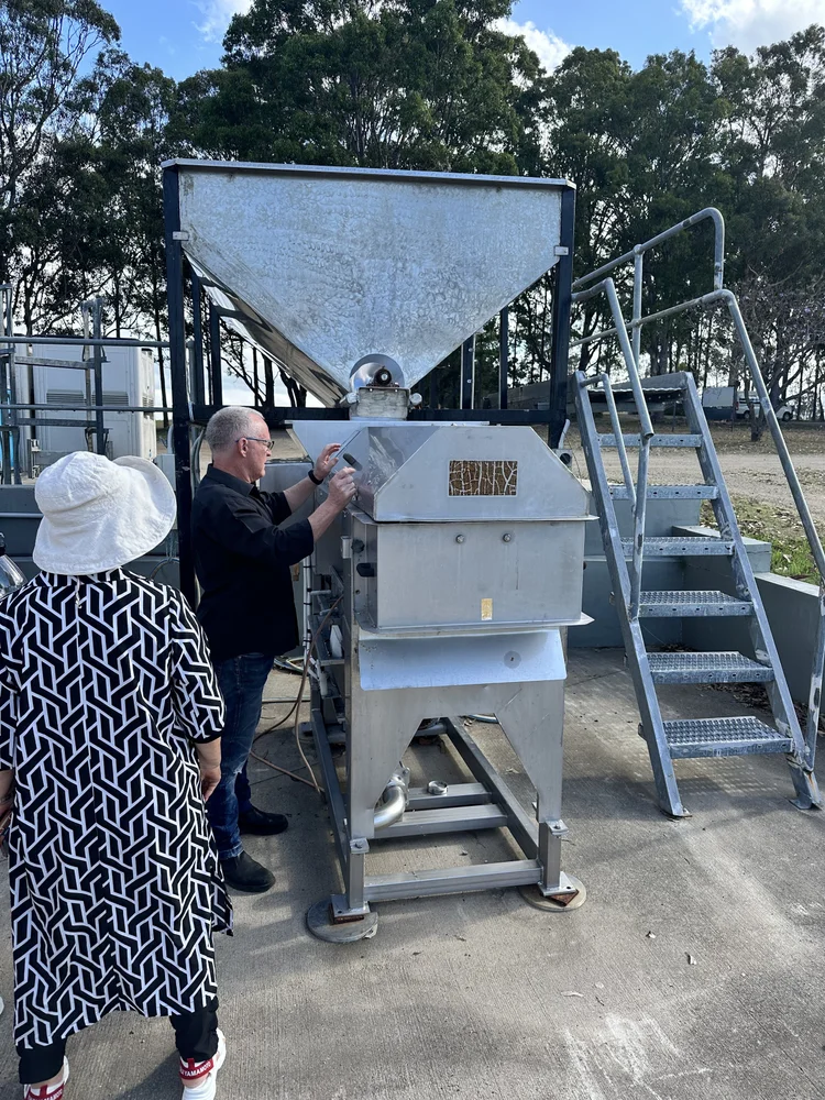 Guests viewing winemaking equipment during a tour of Horner Winery