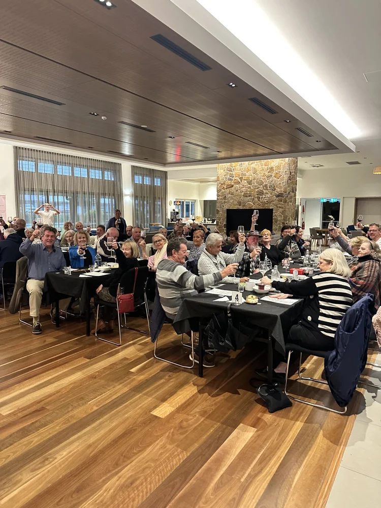 A large group enjoying a wine tasting at Nelson Bay
