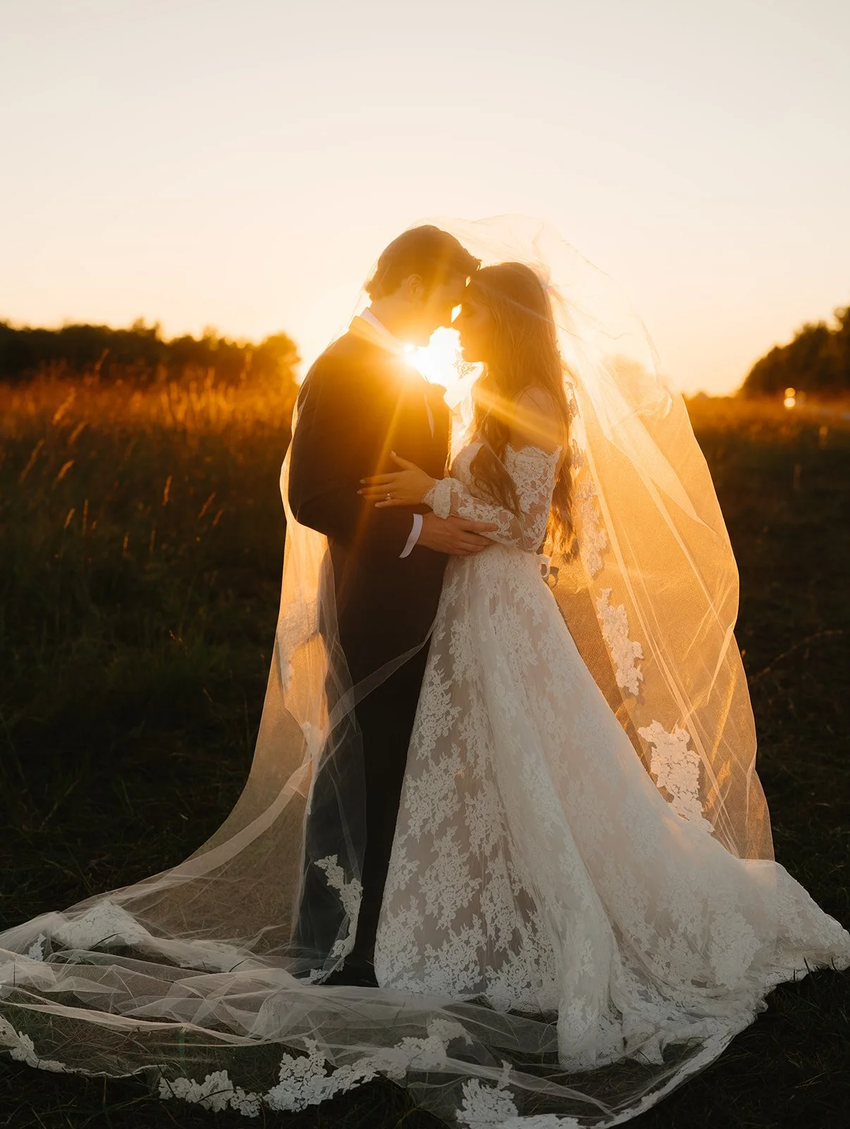 Madison Marietta and John Miller's wedding photos in Pitsburg Kansas at sunset