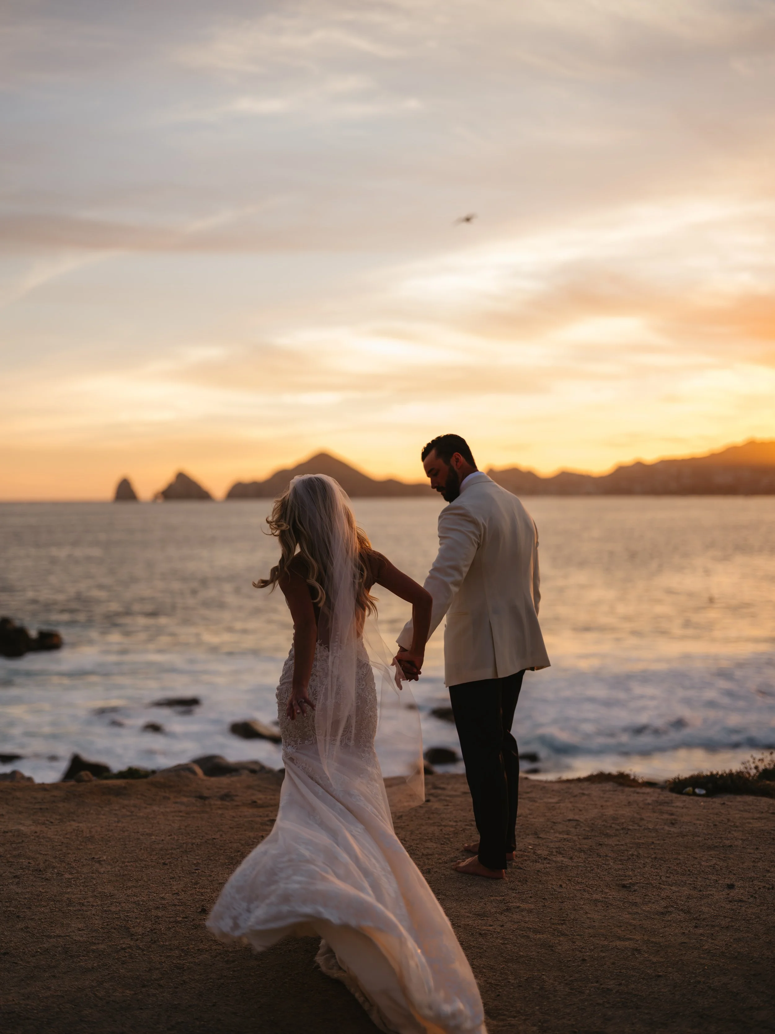 wedding photo near the cape hotel in cabo san lucas mexico taken by Miles Witt Boyer