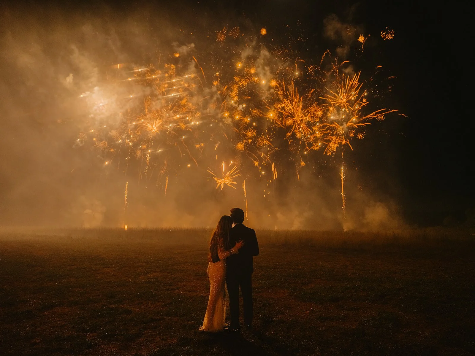 Pitsburg, Kansas wedding day fireworks captured by Miles Witt Boyer