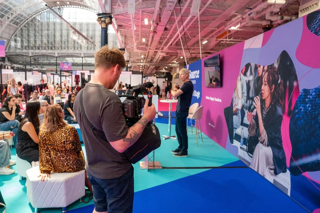 Image of Thomas Stanley at Source Fashion in the London Olympia shooting with his Sony FX6 on a cinesaddle.