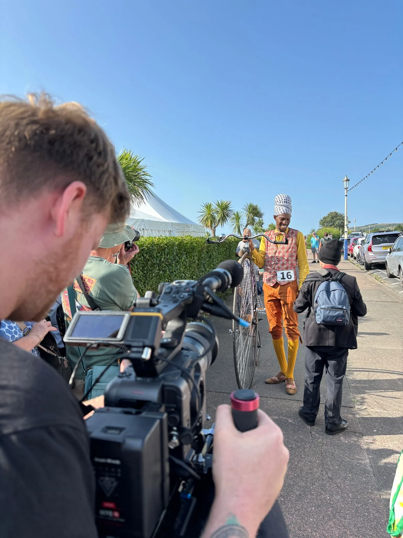 A photograph of Thomas Stanley, a videographer from Southampton, UK, filming on his Sony FX6 a documentary style event video for a client in Eastbourne, UK.