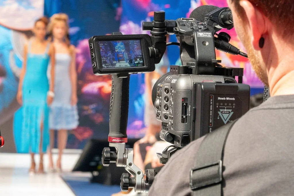 Image of Thomas Stanley at Source Fashion in the London Olympia shooting with his Sony FX6 on a tripod. 