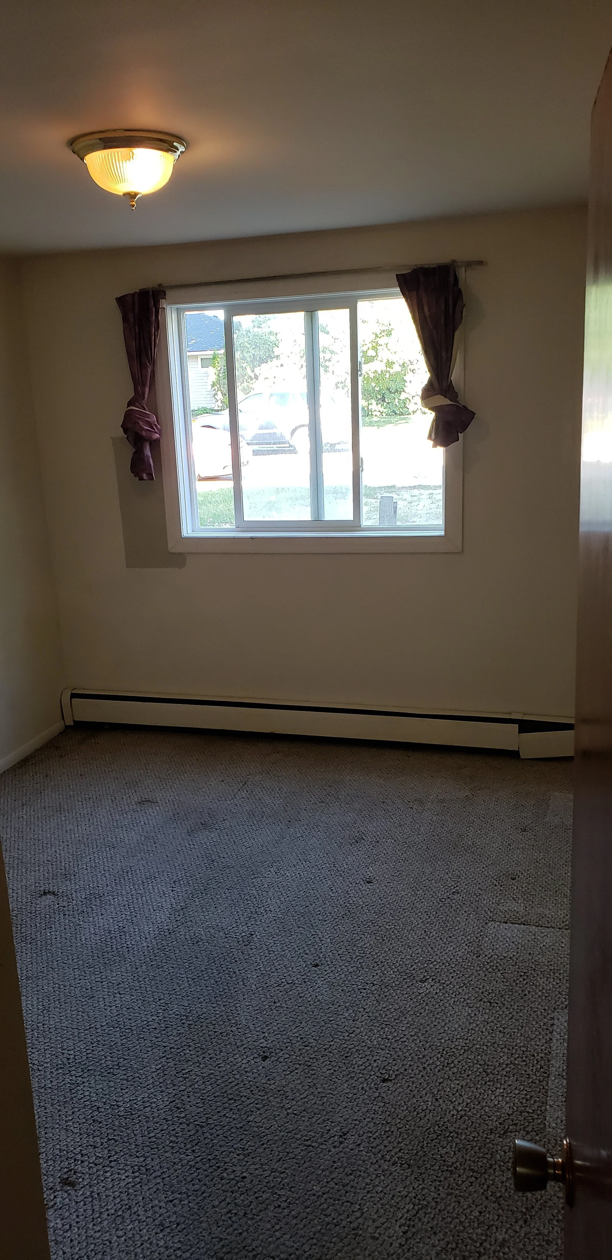 alt="Raymah Cleaning team performing move-out cleaning in Saskatoon apartment"