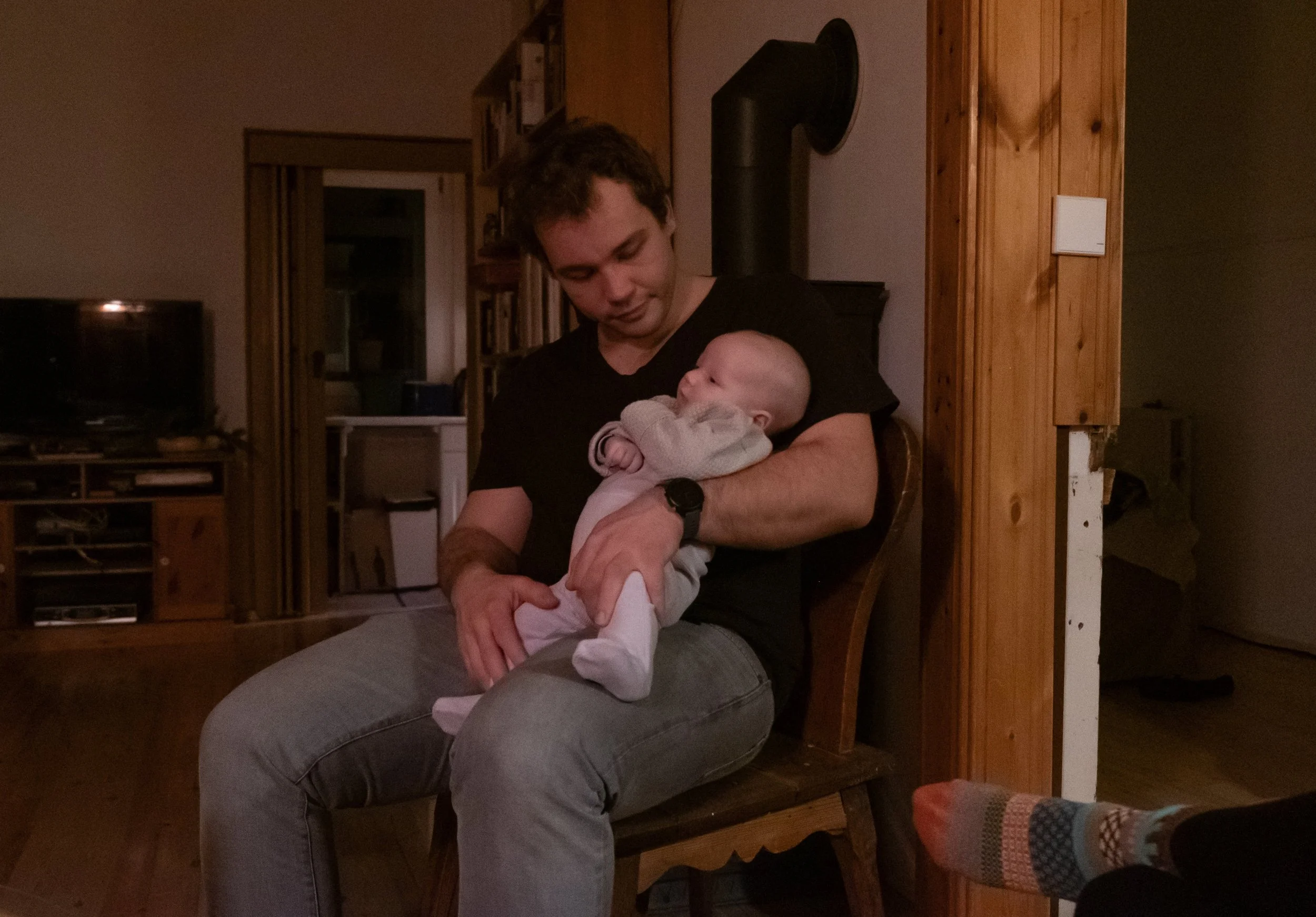 Father with baby at home