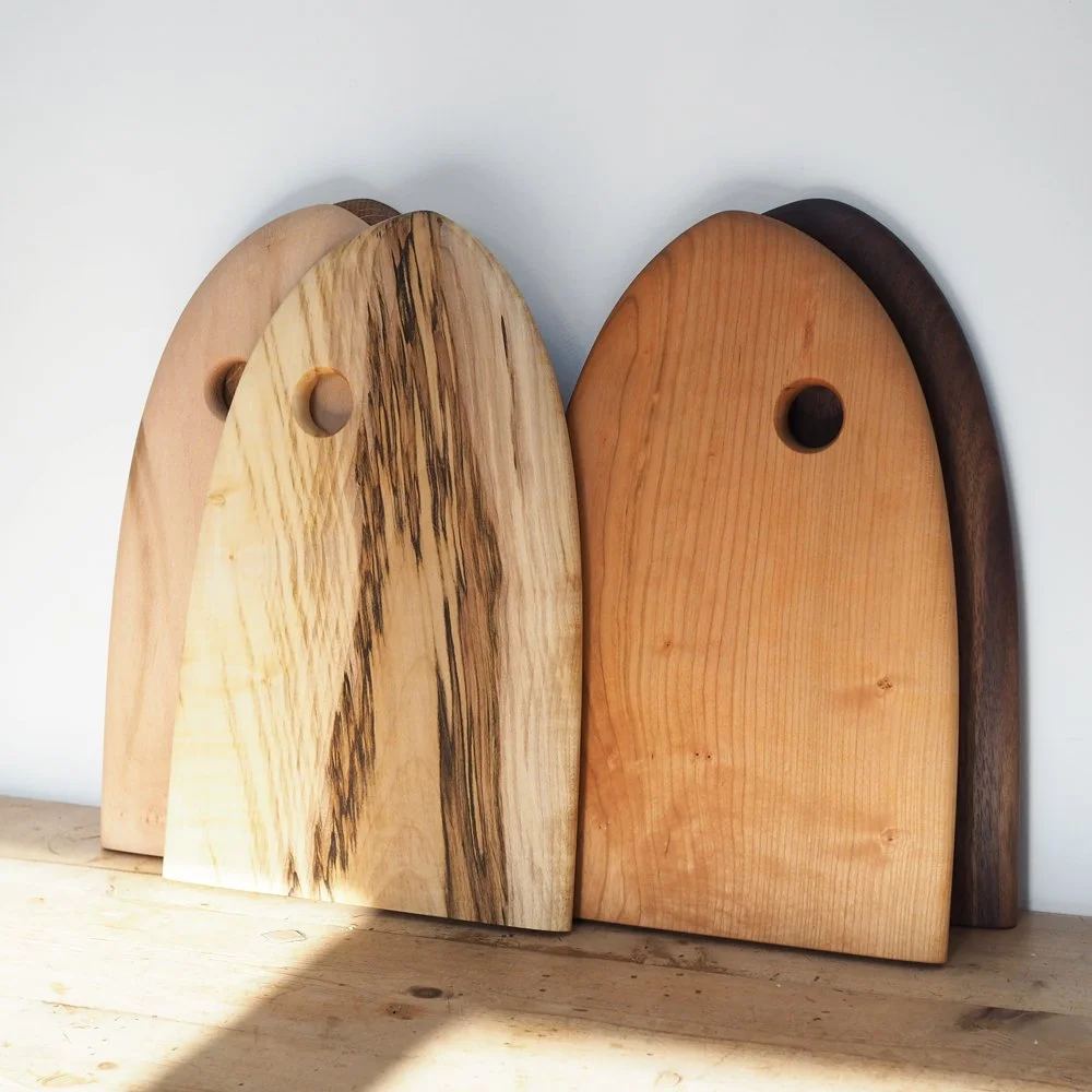curved-solid-wood-chopping-boards-colourful-tones.jpg