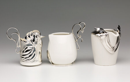 A Group of Birds cream jugs - small winged chickadee and persimmon