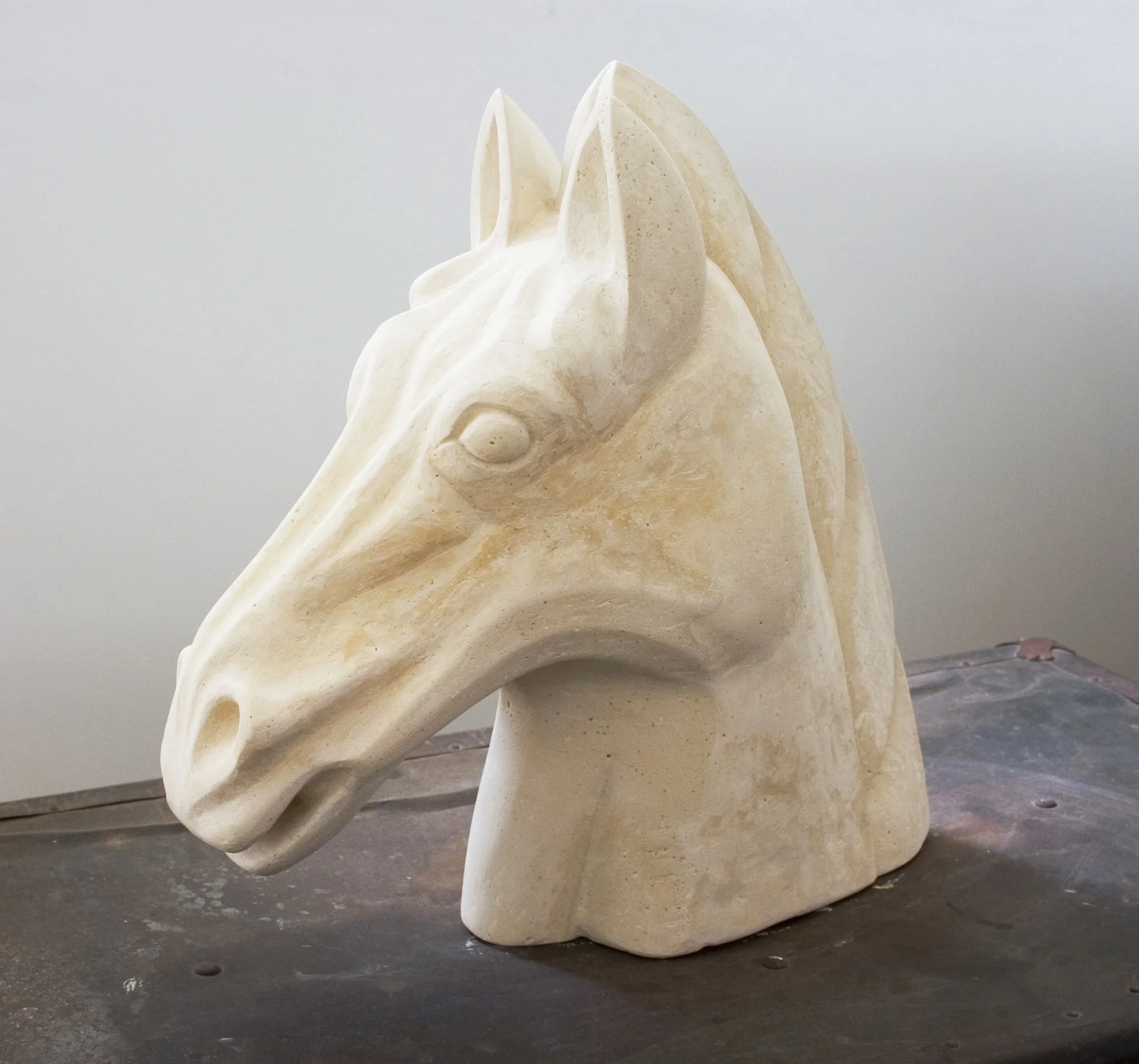 Horse Sculpture on Chest Cretestone.jpg