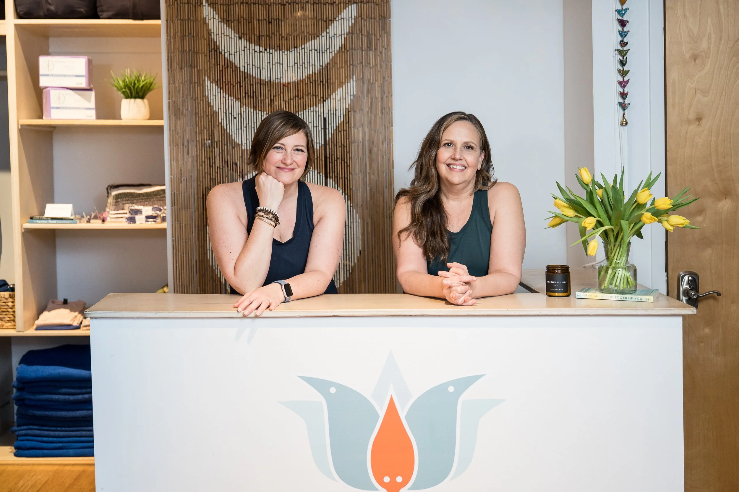Two yoga studio owners smiling during a NJ bradning photoshoot